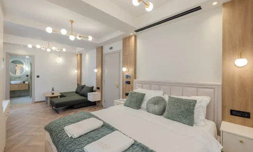 Superior_Family_suite_Living_Room_With_Bed2